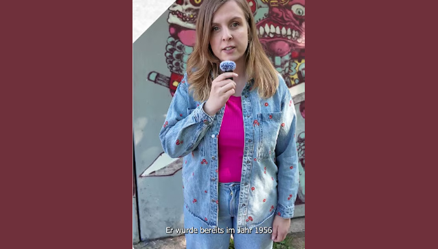 Video-Vorschaubild mit Kathrin Hartmann. Schmuckbild.